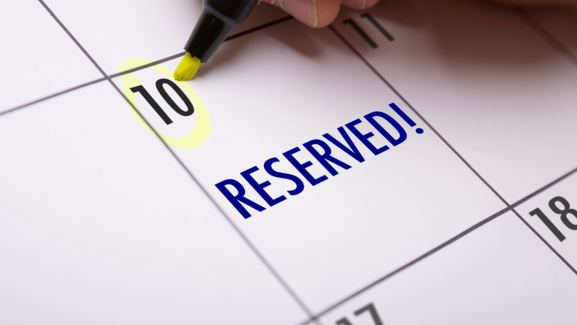 Calendar showing the 10th circled in yellow with "Reserved!" written prominently, symbolizing a confirmed booking or reservation on that date.